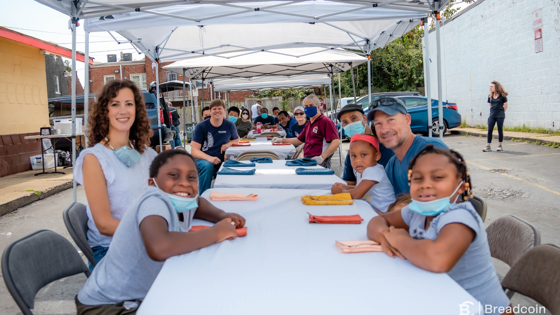 People sitting at a flash table event.