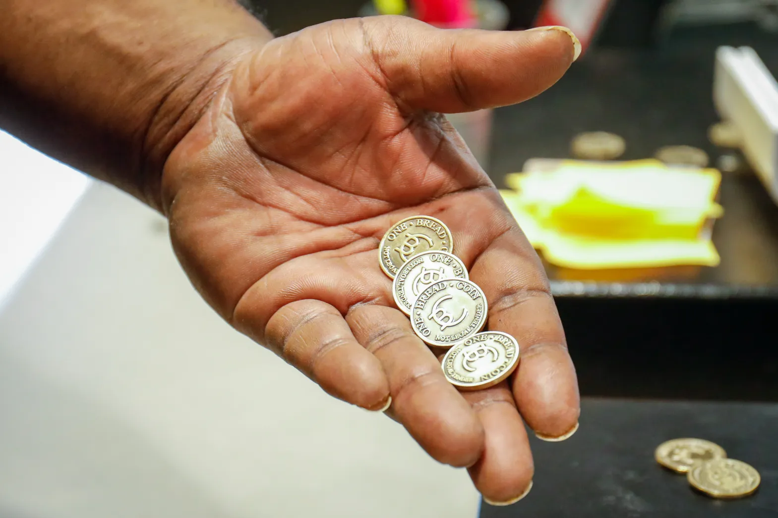 Hand with Breadcoins